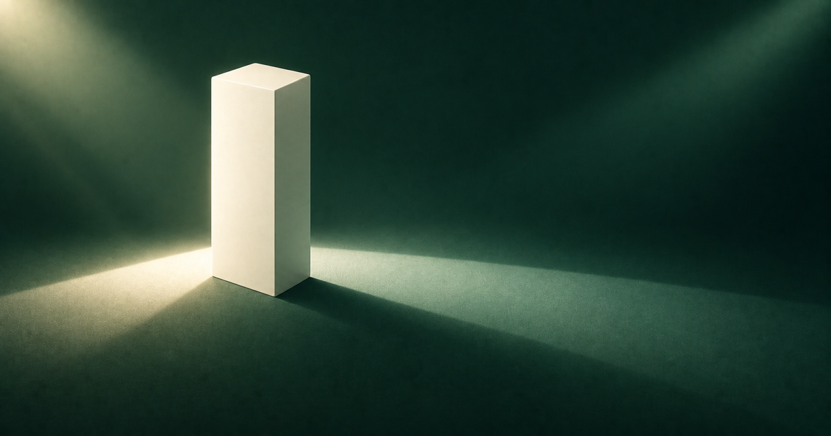 A solid ivory prism casting two differently sized fields of light